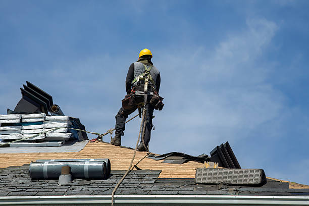 Professional Storm Damage Roof Repair technician working in Mason City, NE